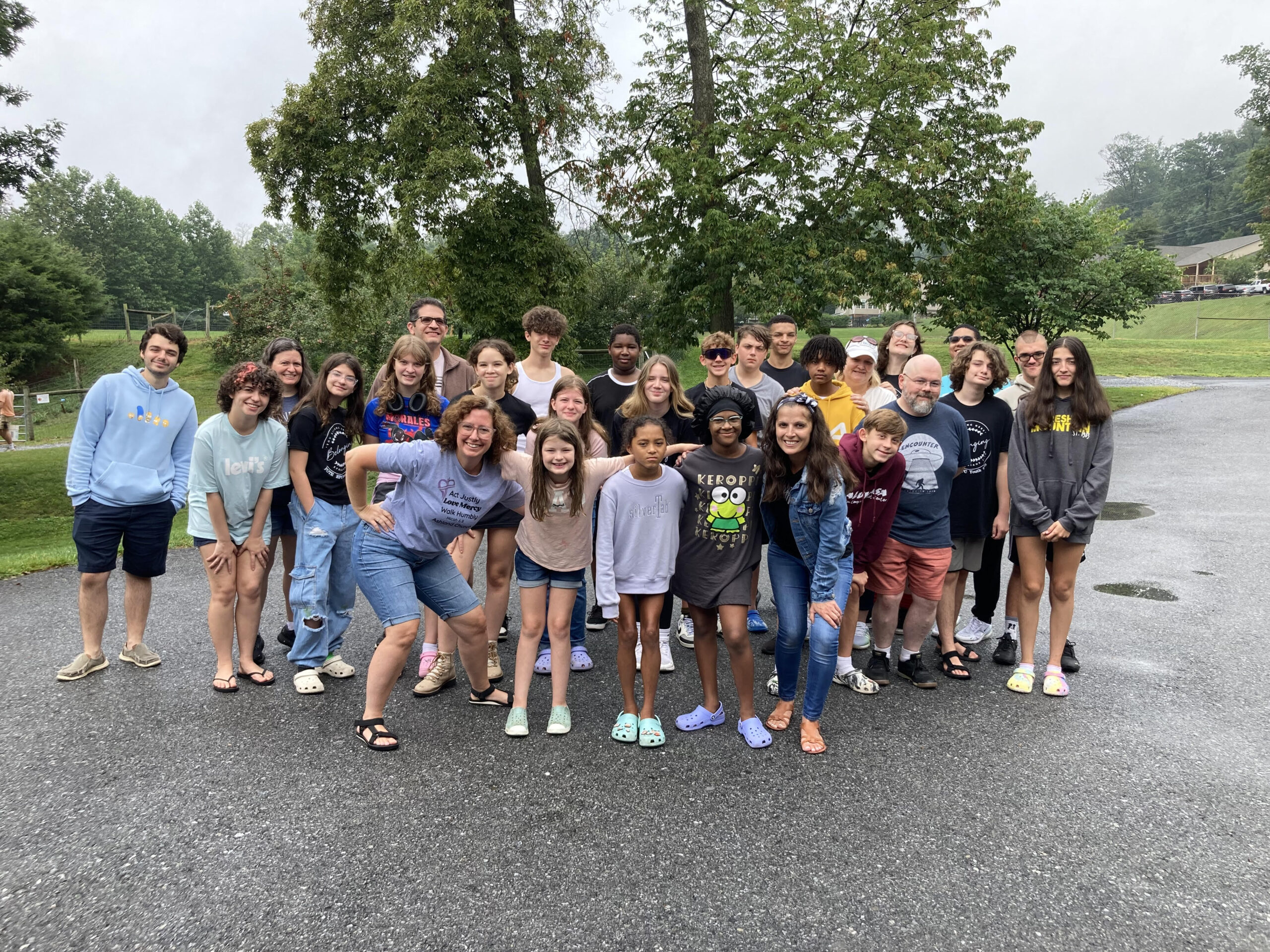 Youth and youth leaders gather for a photo at their summer retreat.